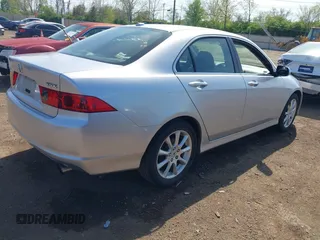 2007 Acura TSX with VIN JH4CL96827C021591, listed as a IAAI auction lot 42103581 with 175,527 mi miles. Bid and sale history available at carsss.com. Image 4.