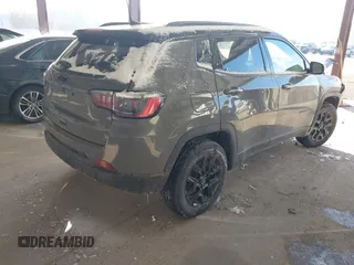 2021 Jeep Compass Sport with VIN 3C4NJDAB2MT591242, listed as a IAAI auction lot 41397874 with 64,653 mi miles and . Bid and sale history available at DreamBid. Image 4.