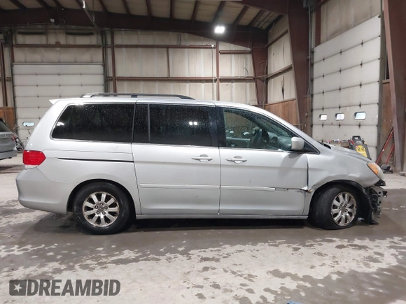 2010 Honda Odyssey EX z VIN 5FNRL3H44AB085662, wystawiony jako IAAI lot #42199416 z przebiegiem 181 221 mil mil oraz . Historia ofert i sprzedaży dostępna na DreamBid. Obrazek 14.