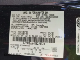 2014 Ford Mustang V6 with VIN 1ZVBP8AM4E5228370, listed as a IAAI auction lot 42130306 with 113,015 mi miles. Bid and sale history available at carsss.com. Image 9.