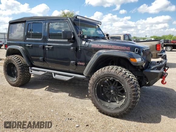 2023 Jeep Wrangler Rubicon with VIN 1C4HJXFG3PW682375, listed as a Copart auction lot 73969434 with Not provided miles and Salvage title. Bid and sale history available at DreamBid. Image 4.