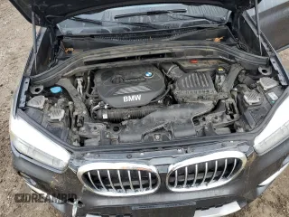 2017 BMW X1 sDrive28i with VIN WBXHU7C3XH5H38074, listed as a Copart auction lot 43088995 with 98,820 mi miles and Salvage Title. Bid and sale history available at carsss.com. Image 13.