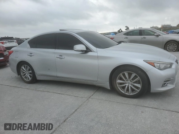 2015 Infiniti Q50 with VIN JN1BV7AP6FM342670, listed as a Copart auction lot 50789215 with 121,117 mi miles and Salvage Title. Bid and sale history available at DreamBid. Image 4.