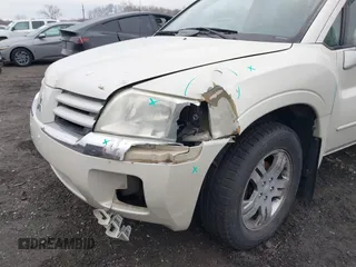 2004 Mitsubishi Endeavor XLS z VIN 4A4MN31S84E005906, wystawiony jako IAAI lot #41676031 z przebiegiem 125 334 mil mil oraz . Historia ofert i sprzedaży dostępna na DreamBid. Obrazek 6.