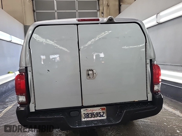 2019 Toyota Tacoma SR with VIN 5TFRX5GN1KX143485, listed as a IAAI auction lot 42763045 with 90,847 mi miles and . Bid and sale history available at DreamBid. Image 39.