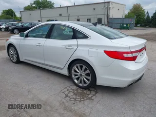 2016 Hyundai Azera Limited z VIN KMHFH4JG6GA547389, wystawiony jako IAAI lot #42374403 z przebiegiem 164 843 mil mil oraz . Historia ofert i sprzedaży dostępna na DreamBid. Obrazek 3.
