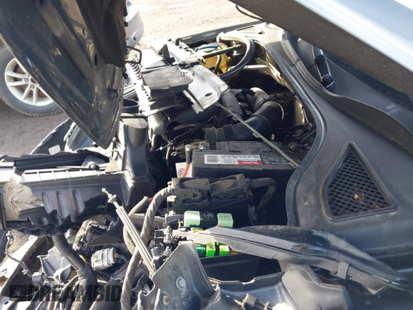 2016 Volkswagen Passat SE z VIN 1VWBT7A32GC016577, wystawiony jako IAAI lot #42334269 z przebiegiem 128 006 mil mil oraz . Historia ofert i sprzedaży dostępna na DreamBid. Obrazek 10.