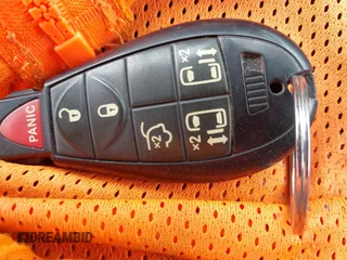 2014 Dodge Grand Caravan SXT z VIN 2C4RDGCG7ER212419, wystawiony jako IAAI lot #42272015 z przebiegiem 175 801 mil mil oraz . Historia ofert i sprzedaży dostępna na DreamBid. Obrazek 11.