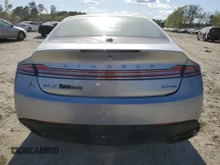 2015 Lincoln MKZ z VIN 3LN6L2G95FR603693, wystawiony jako Copart lot #53362845 z przebiegiem 171 107 mil mil oraz Szkoda całkowita • Salvage title. Historia ofert i sprzedaży dostępna na DreamBid. Obrazek 6.