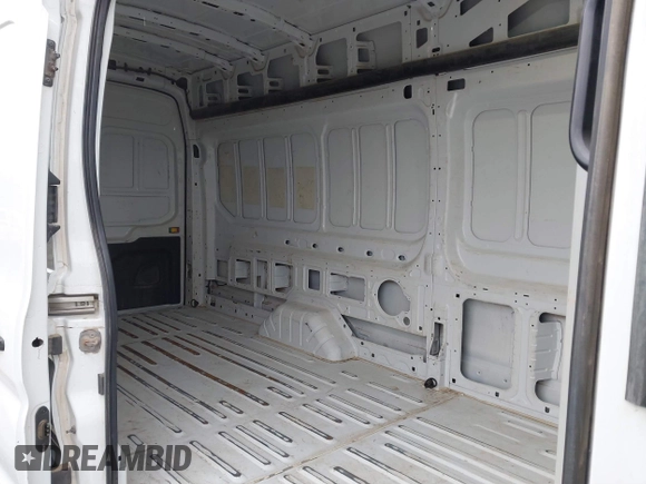 2023 Ford Transit Cargo with VIN 1FTBR3U89PKA07396, listed as a IAAI auction lot 41878907 with 103,402 mi miles and . Bid and sale history available at DreamBid. Image 8.