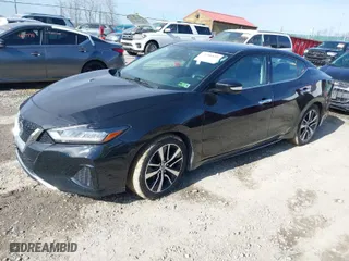 2021 Nissan Maxima SV with VIN 1N4AA6CV5MC513640, listed as a IAAI auction lot 41706829 with 52,718 mi miles. Bid and sale history available at carsss.com. Image 2.