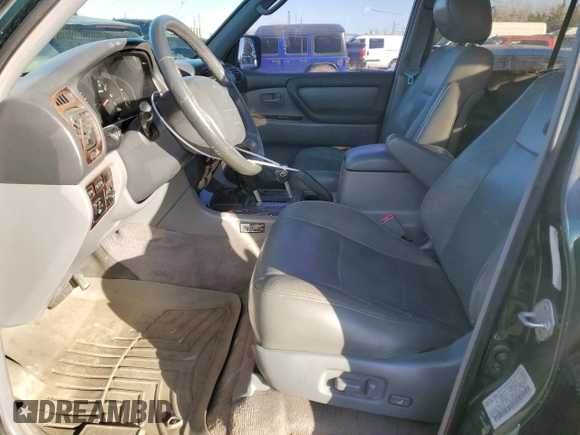 1999 Toyota Land Cruiser with VIN JT3HT05J5X0031805, listed as a Copart auction lot 87014384 with 233,248 mi miles and Clean Title. Bid and sale history available at carsss.com. Image 7.
