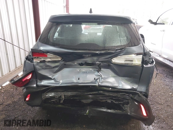 2022 Toyota Corolla Cross L with VIN 7MUAAAAG9NV034659, listed as a IAAI auction lot 42125356 with 14,631 mi miles and . Bid and sale history available at DreamBid. Image 6.