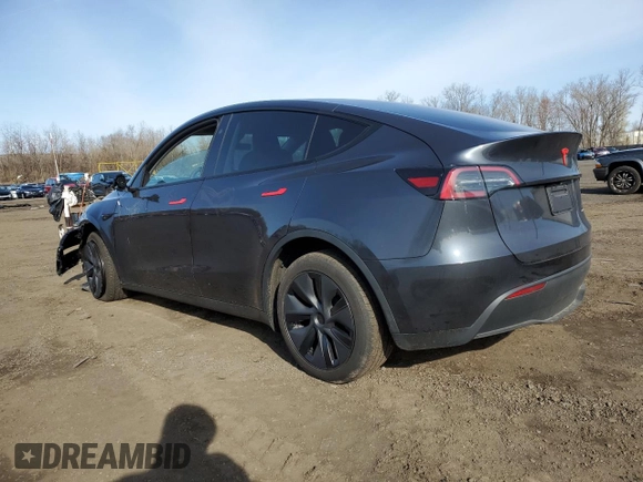 2025 Tesla Model Y Long Range with VIN 7SAYGDEE4SF291068, listed as a Copart auction lot 51204615 with 2,958 mi miles and Salvage Title. Bid and sale history available at DreamBid. Image 2.