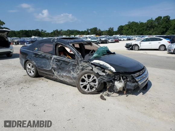 2012 Ford Fusion SE with VIN 3FAHP0HA3CR167698, listed as a Copart auction lot 55909695 with 128,025 mi miles and Salvage title. Bid and sale history available at DreamBid. Image 4.