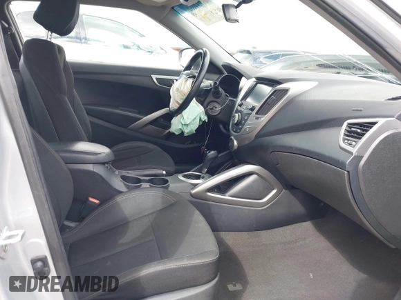 2017 Hyundai Veloster Value Edition with VIN KMHTC6AD2HU308084, listed as a IAAI auction lot 41734062 with 59,354 mi miles. Bid and sale history available at carsss.com. Image 5.