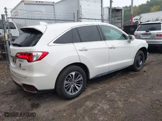 2018 Acura RDX w/Advance Pkg with VIN 5J8TB4H70JL009007, listed as a IAAI auction lot 40382722 with 104,933 mi miles. Bid and sale history available at carsss.com. Image 4.