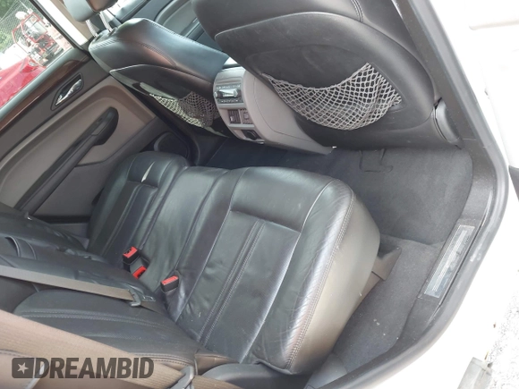 2010 Cadillac SRX Premium Collection with VIN 3GYFNFEY2AS528611, listed as a IAAI auction lot 42770194 with 213,366 mi miles and . Bid and sale history available at DreamBid. Image 8.