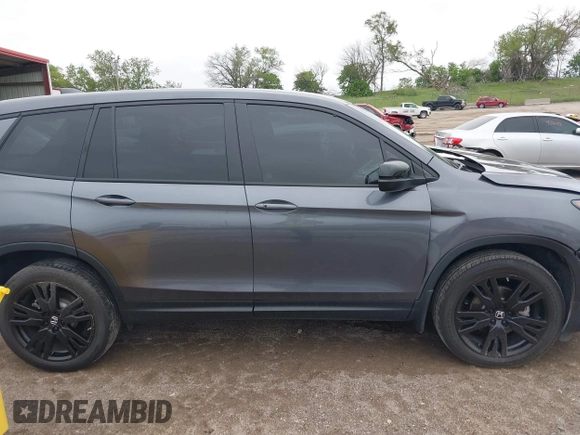2021 Honda Passport Sport with VIN 5FNYF8H26MB032206, listed as a IAAI auction lot 42282932 with 18,952 mi miles and . Bid and sale history available at DreamBid. Image 13.