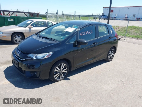 2016 Honda Fit EX with VIN JHMGK5H74GX042436, listed as a IAAI auction lot 42227520 with 106,777 mi miles and . Bid and sale history available at DreamBid. Image 2.