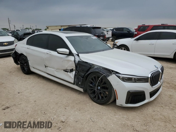 2021 BMW 7 Series 740i with VIN WBA7T2C06MCF88813, listed as a Copart auction lot 49589555 with 60,802 mi miles and Salvage title. Bid and sale history available at DreamBid. Image 4.