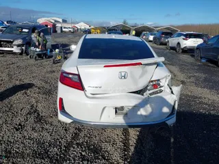 2016 Honda Accord Coupe EX-L with VIN 1HGCT1B89GA008486, listed as a IAAI auction lot 41114706 with 104,590 mi miles. Bid and sale history available at carsss.com. Image 16.