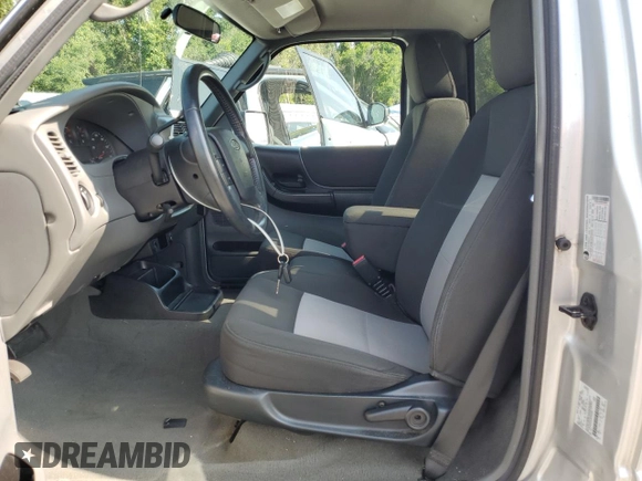 2010 Ford Ranger XL with VIN 1FTKR1AD4APA44985, listed as a Copart auction lot 59517295 with 57,541 mi miles and Salvage title. Bid and sale history available at DreamBid. Image 7.