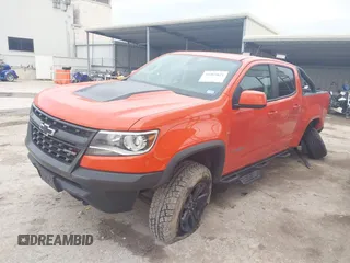 2019 Chevrolet Colorado 4WD ZR2 z VIN 1GCGTEEN9K1333740, wystawiony jako IAAI lot #41565621 z przebiegiem 71 484 mil mil oraz . Historia ofert i sprzedaży dostępna na DreamBid. Obrazek 2.
