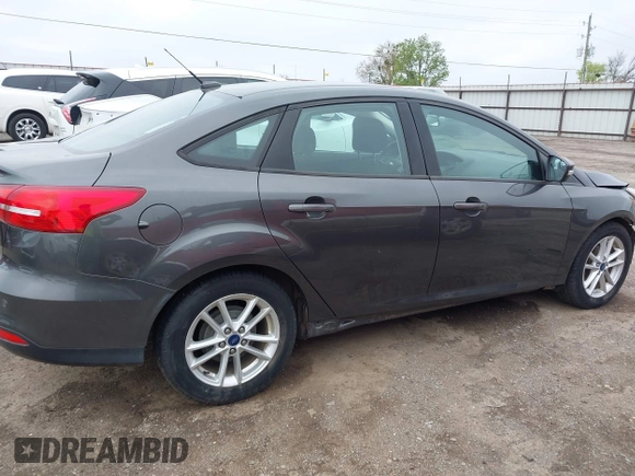 2016 Ford Focus SE with VIN 1FADP3F21GL324547, listed as a IAAI auction lot 41860377 with 39,410 mi miles. Bid and sale history available at carsss.com. Image 13.