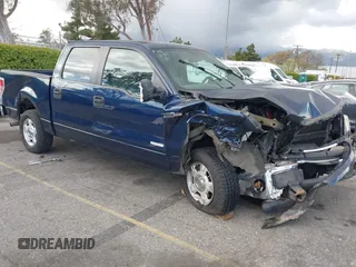 2013 Ford F-150 XL with VIN 1FTFW1CTXDFA92435, listed as a IAAI auction lot 41944748 with 147,016 mi miles. Bid and sale history available at carsss.com. Image 1.