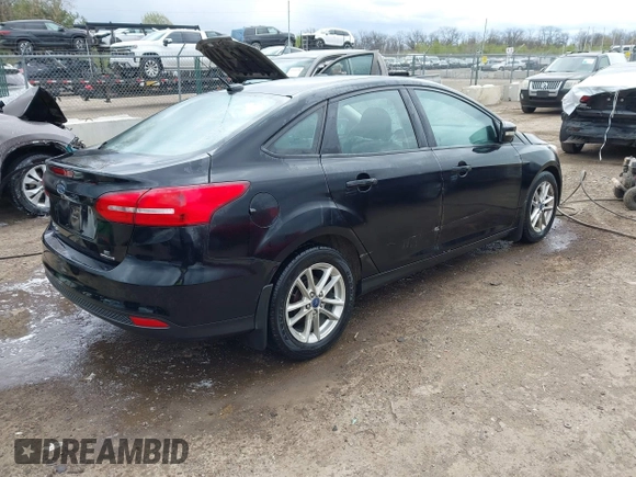 2016 Ford Focus SE with VIN 1FADP3F26GL280805, listed as a IAAI auction lot 42031492 with 146,986 mi miles. Bid and sale history available at carsss.com. Image 4.