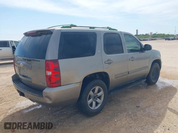 2009 Chevrolet Tahoe 2LT z VIN 1GNEC23369R181474, wystawiony jako IAAI lot #42222270 z przebiegiem 259 621 mil mil oraz . Historia ofert i sprzedaży dostępna na DreamBid. Obrazek 4.