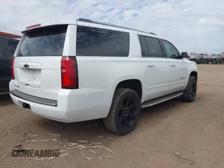 2015 Chevrolet Suburban LTZ with VIN 1GNSKKKC5FR691219, listed as a IAAI auction lot 41921973 with 169,119 mi miles and . Bid and sale history available at DreamBid. Image 4.