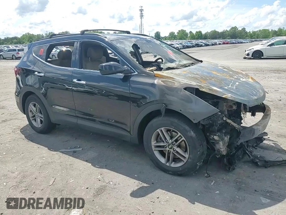 2017 Hyundai Santa Fe 2.4L z VIN 5NMZUDLB9HH013230, wystawiony jako Copart lot #55888975 z przebiegiem Nie podano mil oraz Szkoda całkowita • Salvage title. Historia ofert i sprzedaży dostępna na DreamBid. Obrazek 14.