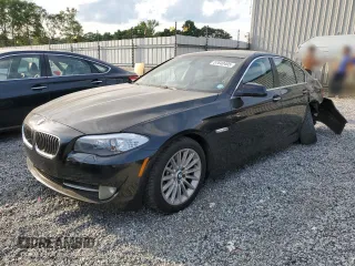2013 BMW 5 Series 535i with VIN WBAFR7C52DC824180, listed as a Copart auction lot 57640495 with 128,663 mi miles and Salvage title. Bid and sale history available at DreamBid. Image 1.