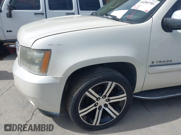 2008 Chevrolet Tahoe LTZ with VIN 1GNFK13078R190092, listed as a IAAI auction lot 41690795 with 147,041 mi miles and . Bid and sale history available at DreamBid. Image 15.