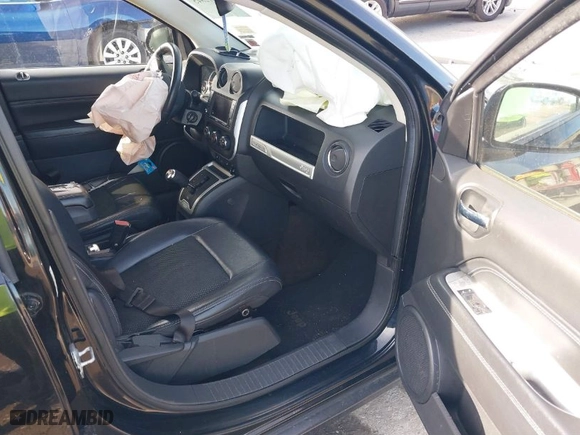 2014 Jeep Compass Latitude with VIN 1C4NJDEB0ED622084, listed as a IAAI auction lot 40412845 with 191,571 mi miles. Bid and sale history available at carsss.com. Image 5.