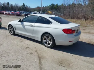 2014 BMW 4 Series 428i xDrive with VIN WBA3N5C55EK196898, listed as a IAAI auction lot 42112580 with 184,381 mi miles. Bid and sale history available at carsss.com. Image 3.