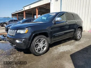 2019 Jeep Grand Cherokee Overland with VIN 1C4RJECG5KC602873, listed as a Copart auction lot 46701925 with 96,444 mi miles and Salvage Title. Bid and sale history available at carsss.com. Image 1.