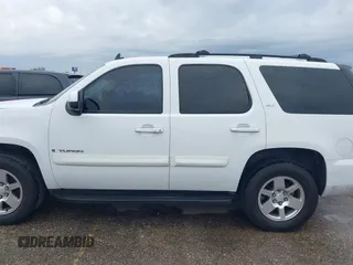 2009 GMC Yukon SLT w/4SA with VIN 1GKFK33049R153415, listed as a IAAI auction lot 41896770 with 182,256 mi miles. Bid and sale history available at carsss.com. Image 14.