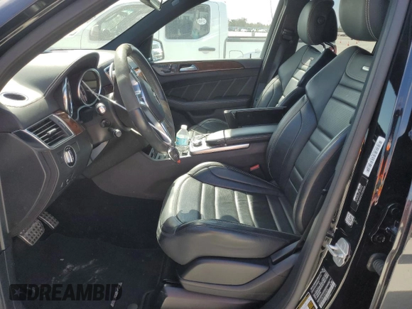 2015 Mercedes-Benz M 63 AMG with VIN 4JGDA7EB1FA470876, listed as a Copart auction lot 77074354 with Not Provided miles and Salvage Title. Bid and sale history available at carsss.com. Image 7.