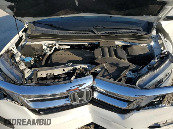 2020 Honda Pilot Touring 8-Passenger with VIN 5FNYF5H98LB022755, listed as a Copart auction lot 44343355 with 78,095 mi miles and Salvage Title. Bid and sale history available at DreamBid. Image 13.