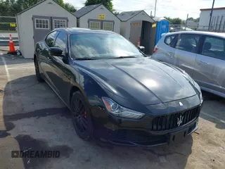 2015 Maserati Ghibli z VIN ZAM57XSA2F1133762, wystawiony jako IAAI lot #42484050 z przebiegiem 83 948 mil mil oraz . Historia ofert i sprzedaży dostępna na DreamBid. Obrazek 1.