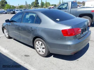 2014 Volkswagen Jetta Sedan SE with VIN 3VWD17AJ8EM285143, listed as a IAAI auction lot 41880109 with 123,831 mi miles. Bid and sale history available at carsss.com. Image 3.