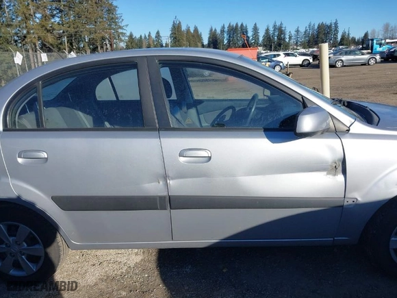 2009 Kia Rio with VIN KNADE223896549541, listed as a IAAI auction lot 41562013 with NaN miles. Bid and sale history available at carsss.com. Image 13.
