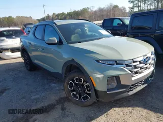 2022 Hyundai Santa Cruz SEL Premium z VIN 5NTJDDAF8NH030975, wystawiony jako IAAI lot #41768166 z przebiegiem 76 756 mil mil oraz . Historia ofert i sprzedaży dostępna na DreamBid. Obrazek 1.