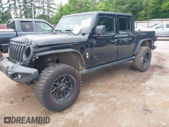 2021 Jeep Gladiator Sport S with VIN 1C6JJTAM7ML554412, listed as a IAAI auction lot 42199167 with 74,263 mi miles and . Bid and sale history available at DreamBid. Image 2.