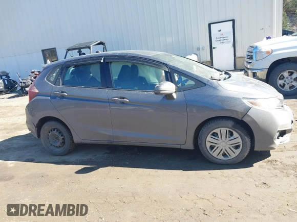 2018 Honda Fit LX z VIN 3HGGK5G44JM716592, wystawiony jako IAAI lot #41878820 z przebiegiem 70 464 mil mil oraz . Historia ofert i sprzedaży dostępna na DreamBid. Obrazek 13.