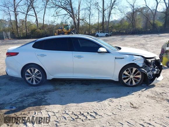 2016 Kia Optima SX Turbo with VIN 5XXGW4L2XGG084628, listed as a IAAI auction lot 41668592 with 116,535 mi miles and . Bid and sale history available at carsss.com. Image 13.