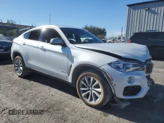 2019 BMW X6 sDrive35i z VIN 5UXKU0C55K0G92734, wystawiony jako Copart lot #81233084 z przebiegiem 60 365 mil mil oraz Szkoda całkowita • Salvage title. Historia ofert i sprzedaży dostępna na DreamBid. Obrazek 4.